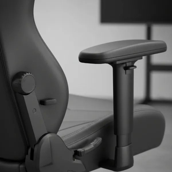 Close-up of Boulies Master Series 4-way adjustable lumbar support and 4D armrests.