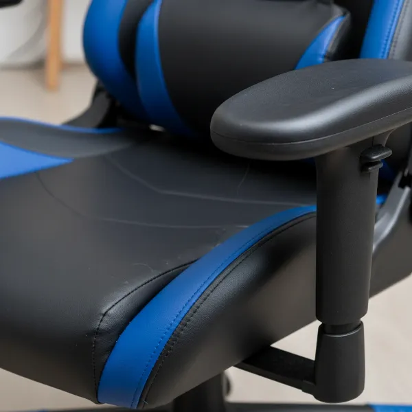 Close-up of a GTRacing gaming chair showing potential PU leather wear and plastic parts.