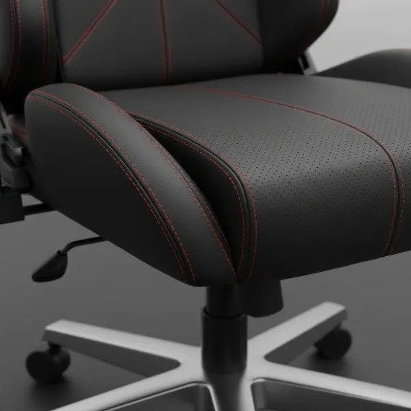 Detailed view of Thermaltake E700's real leather upholstery, micro-perforations, and aluminum five-point base.